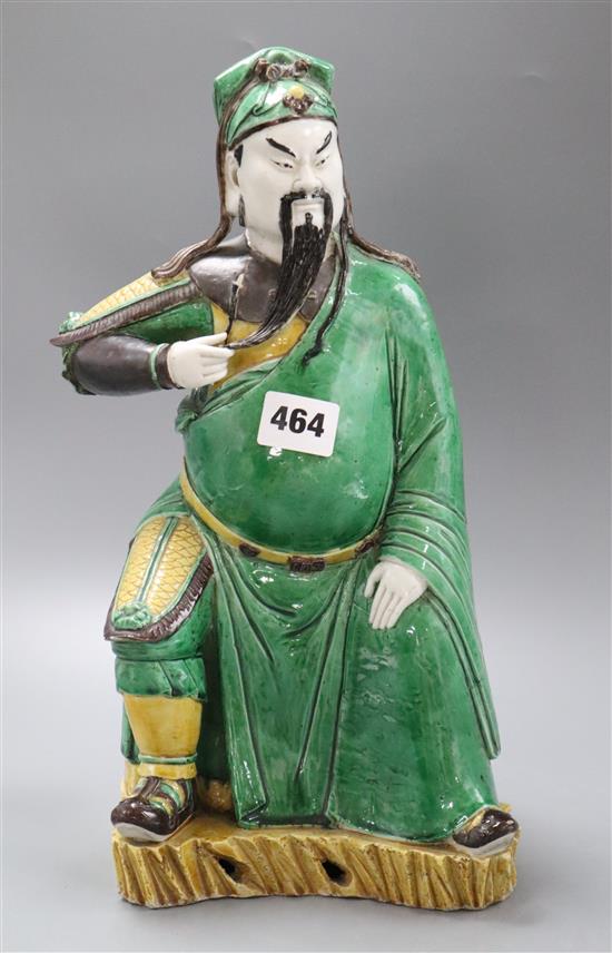 A Japanese pottery figure of a sage